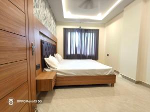 Giường trong phòng chung tại Hotel O NEW CLARK INN & BANQUET
