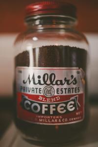 a glass jar of coffee with a label on it at Converted Grain Silo for Unique Glamping Accommodation in Alvin, Illinois in Alvin +25 photos