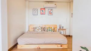 Postel nebo postele na pokoji v ubytování Oxygenphamee