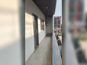 a view of a hallway of a building at Hotel O Lavish Hotel in Greater Noida
