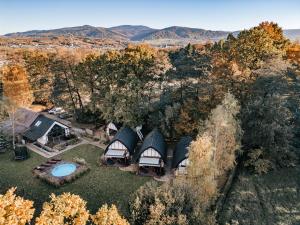 an overhead view of a group of cottages at Sen i Wino, domki i apartament na winnicy ze strefą SPA in Żywiec