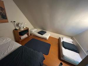 Ένα ή περισσότερα κρεβάτια σε δωμάτιο στο Ski Chalet Ohakune Alpine Village +2 φωτογραφίες