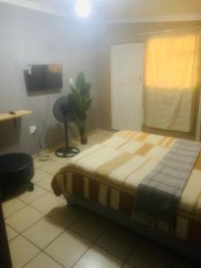 Ένα ή περισσότερα κρεβάτια σε δωμάτιο στο Great home