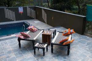 Πισίνα στο ή κοντά στο Mansarovar Bungalows