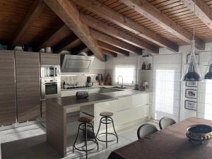 Kuchyň nebo kuchyňský kout v ubytování Imbriani103