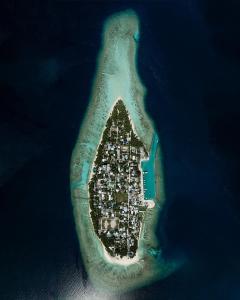 an island in the middle of the ocean at Kirulhiya Omadhoo - Live the Island Dream in Omadhoo