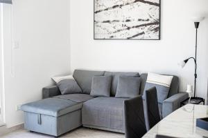 Χώρος καθιστικού στο Seaview Sunset Court