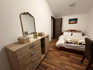 Postel nebo postele na pokoji v ubytování Gintas Comfort