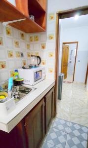 Köök või kööginurk majutusasutuses Mike's HOUSE +4 fotot