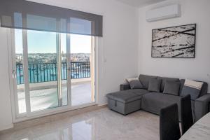 Χώρος καθιστικού στο Seaview Sunset Court