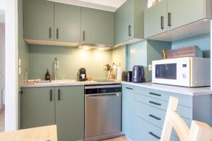 Kuchyň nebo kuchyňský kout v ubytování Face à la Seine - Charmant studio proche Centre