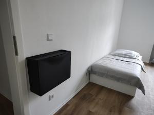 TV a/nebo společenská místnost v ubytování LivingStation Essen R1 bis R4