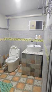 Koupelna v ubytování ทุ่งเศรษฐีโฮมสเตย์แอนด์คาเฟ่