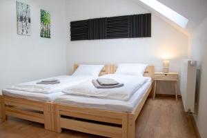 Ένα ή περισσότερα κρεβάτια σε δωμάτιο στο Villa Gallera - 10 minút od Slovenský Raj