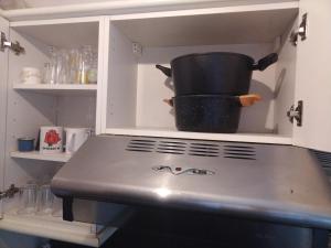 Kuchyň nebo kuchyňský kout v ubytování Appartement familiale face à un square arboré + 12 fotografií