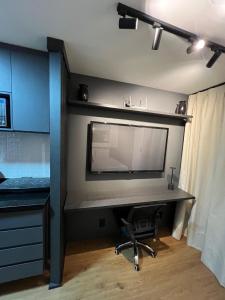 TV/trung tâm giải trí tại Studio Moderno com automação e vista incrível +7 ảnh