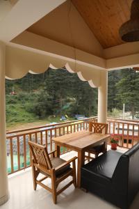 Balkón nebo terasa v ubytování Hotel Purnima Old kasol