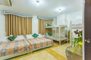 Postel nebo postele na pokoji v ubytování Yahweh's Spring Retreat and Resort + 56 fotografií