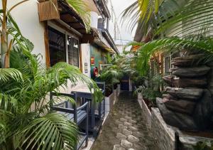 a hallway of a house with plants in it at Retreat Cameroon BASTOS in Yaoundé