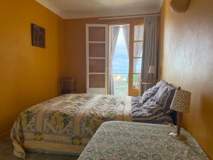 Postel nebo postele na pokoji v ubytování Le Racou Residence Les Muriers 48 m2 F3