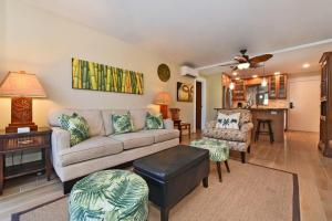 a living room with a couch and a table at Pacific Shores B102 · PacSB102 Family Getaway 3BD Across Beach in Kihei