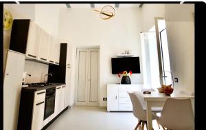 Kuchyň nebo kuchyňský kout v ubytování Ambra Apartment