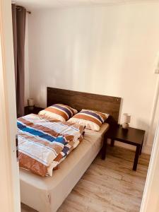 Postel nebo postele na pokoji v ubytování 32EG faculté médecine, hôpitaux, vinatier + 1 fotografie