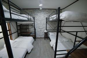 Ένα ή περισσότερα κρεβάτια σε δωμάτιο στο soleil levant