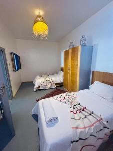 Postel nebo postele na pokoji v ubytování Sunrise Camp