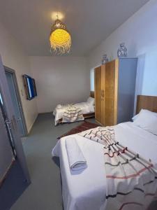 Postel nebo postele na pokoji v ubytování Sunrise Camp