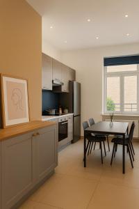 Η κουζίνα ή μικρή κουζίνα στο Petit Chatelet Rooms