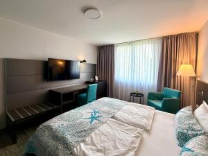 Postel nebo postele na pokoji v ubytování Elegantes Smart Apartment in Szene-Viertel