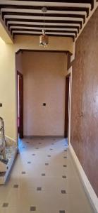 an empty room with a wall and a ceiling at Villa in Meknès +3 photos