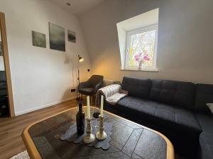 Posezení v ubytování M-Suites - Near Frankfurt Airport + 17 fotografií