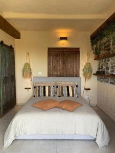 Ένα ή περισσότερα κρεβάτια σε δωμάτιο στο Tramontana Camera Vista