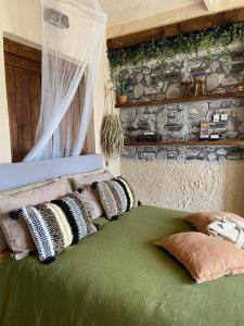 Ένα ή περισσότερα κρεβάτια σε δωμάτιο στο Tramontana Camera Vista