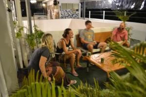 a group of people sitting in a room at Ringo's Foyer in Melaka