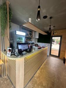 a kitchen with a counter with a computer on it at Panorama in Bukorovac