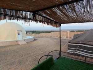 a view from the inside of a dome tent at Private VIP Tent in the Desert in Ḩawīyah +13 photos