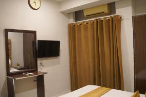 Μια τηλεόραση ή/και κέντρο ψυχαγωγίας στο Grand Pearl Hotel