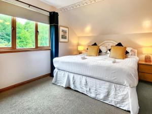 Ένα ή περισσότερα κρεβάτια σε δωμάτιο στο Foxglove Cottage 2 - Uk50020