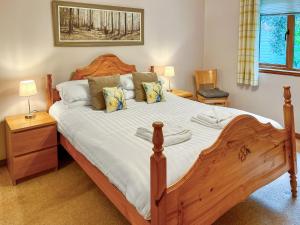 Ένα ή περισσότερα κρεβάτια σε δωμάτιο στο Foxglove Cottage 2 - Uk50020