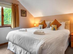 Ένα ή περισσότερα κρεβάτια σε δωμάτιο στο Foxglove Cottage 1 - Uk50019