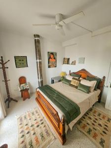 Giường trong phòng chung tại Le Chalet di Tabarka