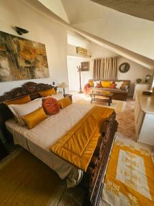 Giường trong phòng chung tại Le Chalet di Tabarka