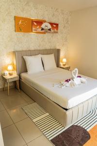 Ένα ή περισσότερα κρεβάτια σε δωμάτιο στο CityRoss-Apt T3-2 chambres -4 pers-Ste Clotilde