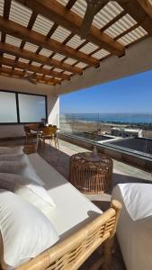 Ένα ή περισσότερα κρεβάτια σε δωμάτιο στο Golden View - Sea of Galilee