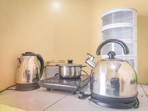 Kuchyň nebo kuchyňský kout v ubytování Palma Lavender Room Klaten