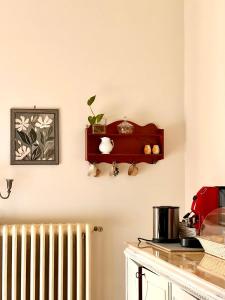 Příslušenství pro přípravu čaje a kávy v ubytování Casa Jolanda B&B