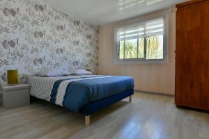 Postel nebo postele na pokoji v ubytování Le Caltha